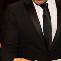 マイアミ・チルドレンズ・ホスピタル財団2013年ダイヤモンドボールの式典前日のセレモニーで「クルチアーニC」のブレスレットを着用したサミー・ソーサ氏
