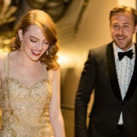 HOLLYWOOD, CA - FEBRUARY 26: Actor Ryan Gosling (R) and actress Emma Stone, winner of Best Actress for 'La La Land' backstage during the 89th Annual Academy Awards at Hollywood & Highland Center on February 26, 2017 in Hollywood, California.