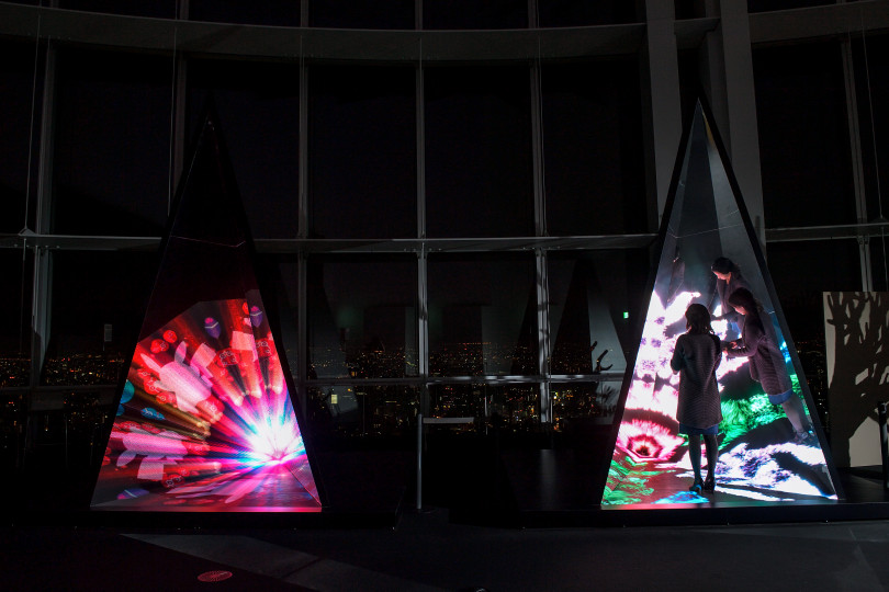 TOKYO, JAPAN - FEBRUARY 08: Reflective echo by WOW is displayed at the Media Ambition Tokyo at Roppongi Hills on February 8, 2018 in Tokyo, Japan. Artwork details. This work repeatedly reflects a kaleidoscopic animation by projecting an image onto the bas