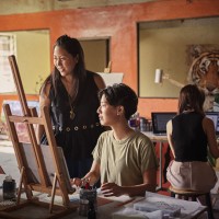 KENZO's Carol Lim and artists ideating in a studio in Cambodia