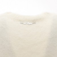 ＜theVirgins＞fluffy ribbon charm knit 2万900円 伊勢丹新宿店限定 カラー：black ribbon/beige ribbon