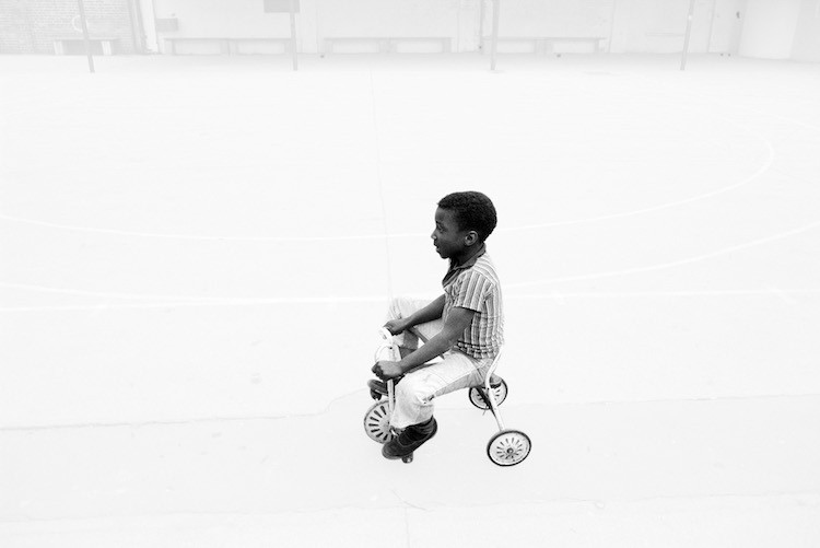 Boy tricycle© Dennis Morris